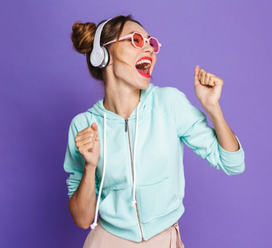 Woman vibing on some uplifiting music